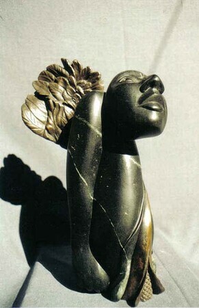 Metamorphosis 1 Steatite, Bronze.  h. 26cm.  Private Collection