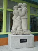 The Gathering ,sandstone h.3 metres. made 1980 reinstalled 2010 Recreation Centre Nelson B.C.